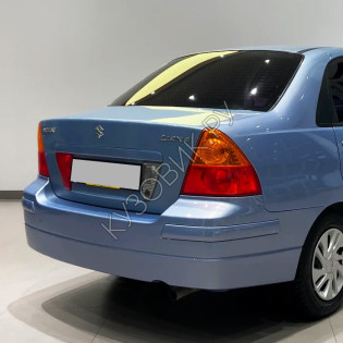 Задний бампер в цвет кузова Suzuki Liana (2002-2007)